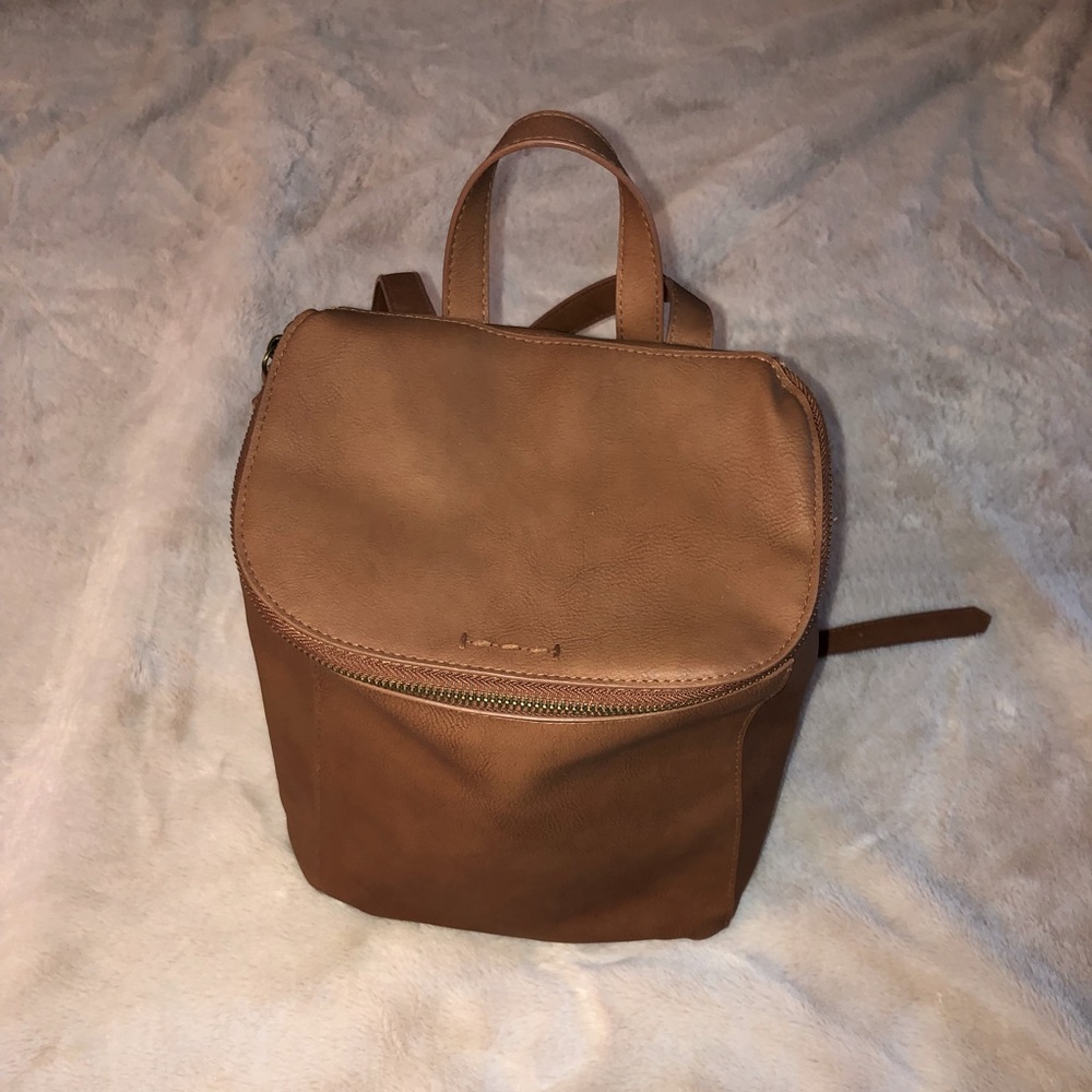 Small faux leather zippered backpack